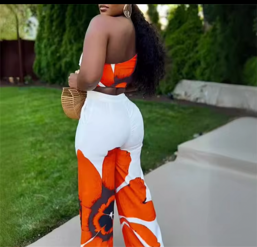 Orange and white floral romper