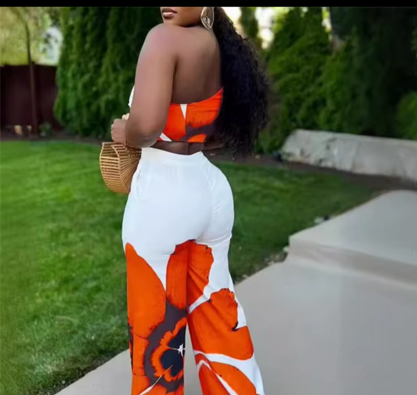 Orange and white floral romper