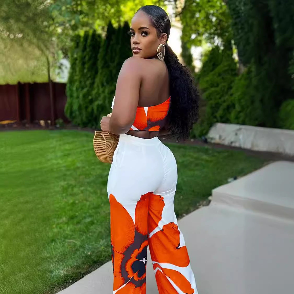 Orange and white floral romper